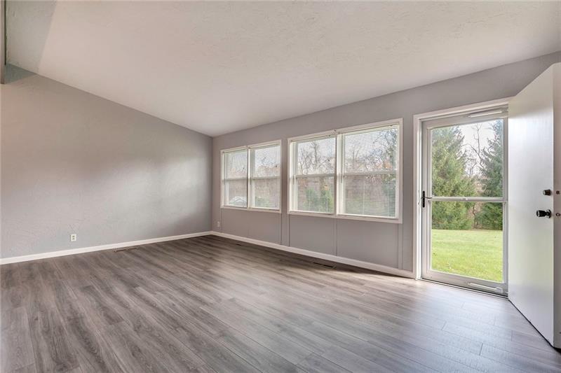 115 Nike Road Coraopolis, PA 15108 - Photo 5 of 25 Large windows allowing the natural light to shine through.