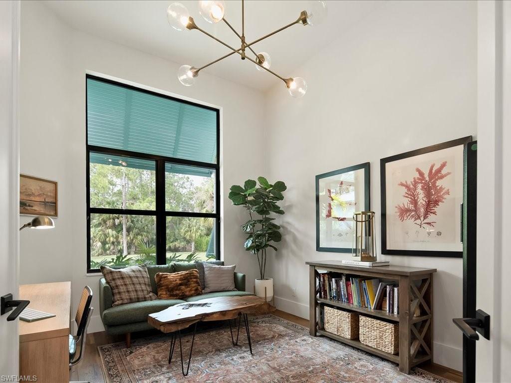 2590 2nd Street Northwest Naples, FL 34120 - Photo 27 of 49 The office/den is located via french doors between the foyer and the master suite for easy access.