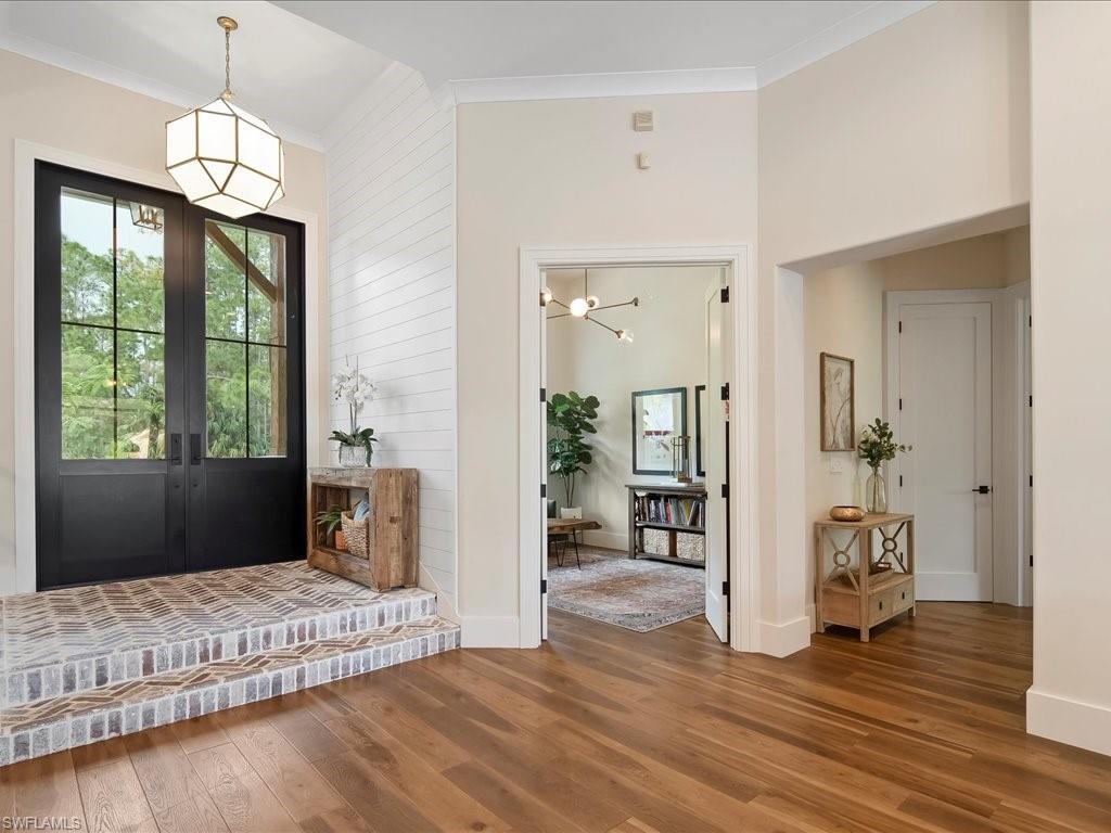 2590 2nd Street Northwest Naples, FL 34120 - Photo 49 of 49 Everybody loves a split floorplan. On the left side of the home as you enter, you'll find the office, master bedroom suite, and the full guest/pool bathroom.