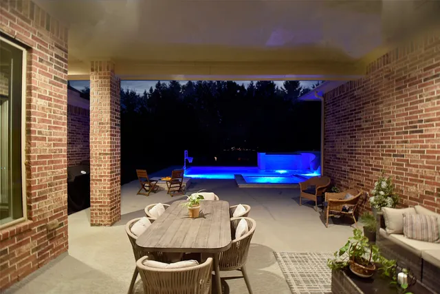 a view of a park with iron fence