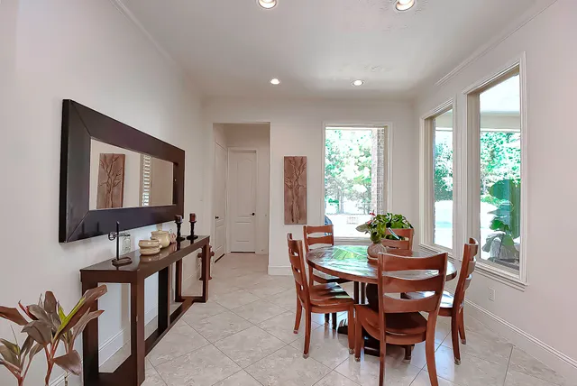 a spacious bedroom with a bed and a couch