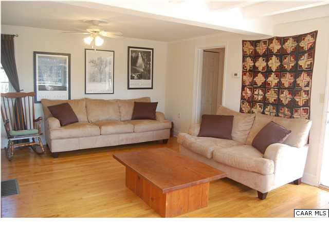 9991 Bridgeport Road Arvonia, VA 23004 - Photo 3 of 24 Living room looking towards back