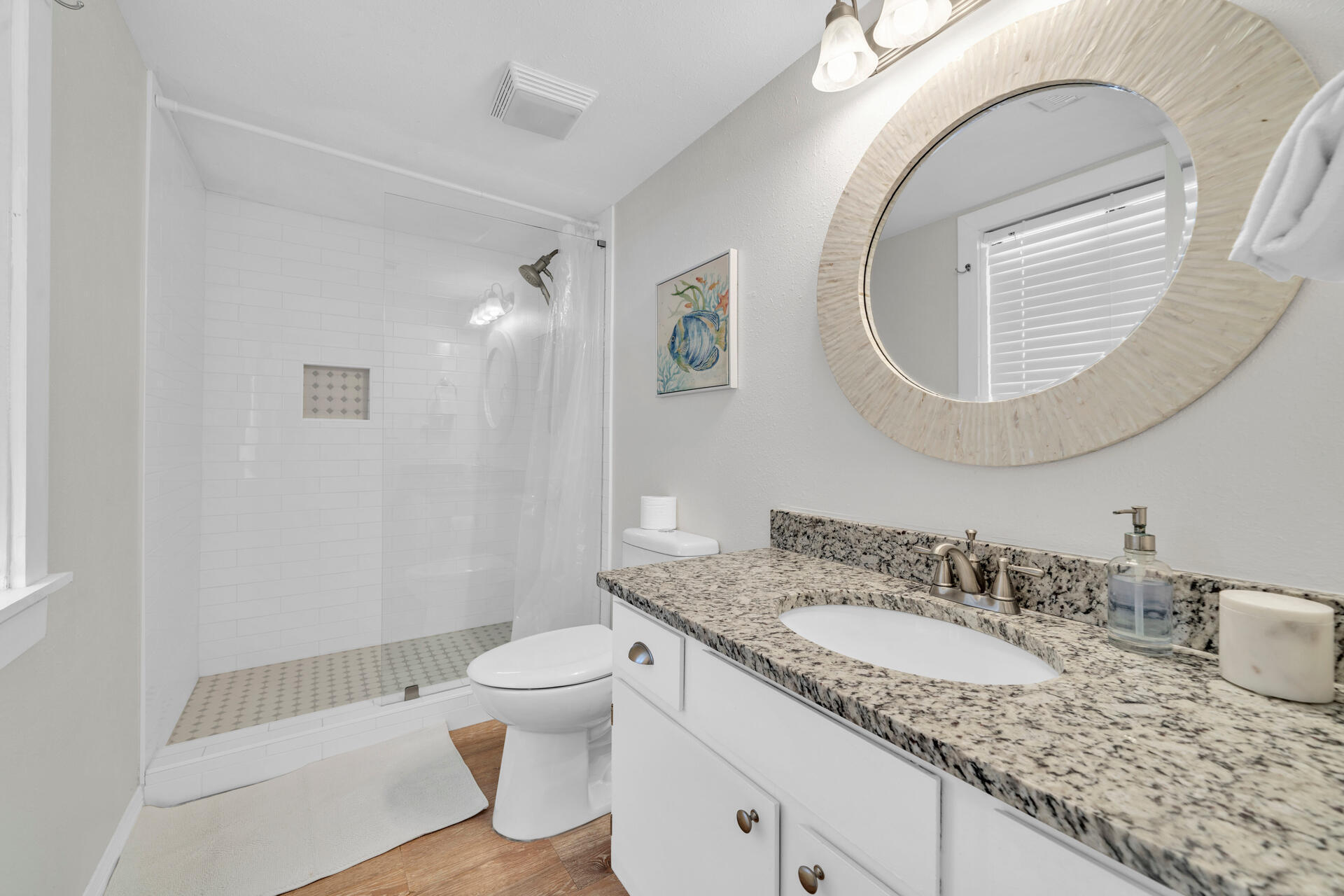 145 Beachfront Trail, Unit 303A Santa Rosa Beach, FL 32459 - Photo 13 of 38 a bathroom with a granite countertop sink a toilet and a mirror