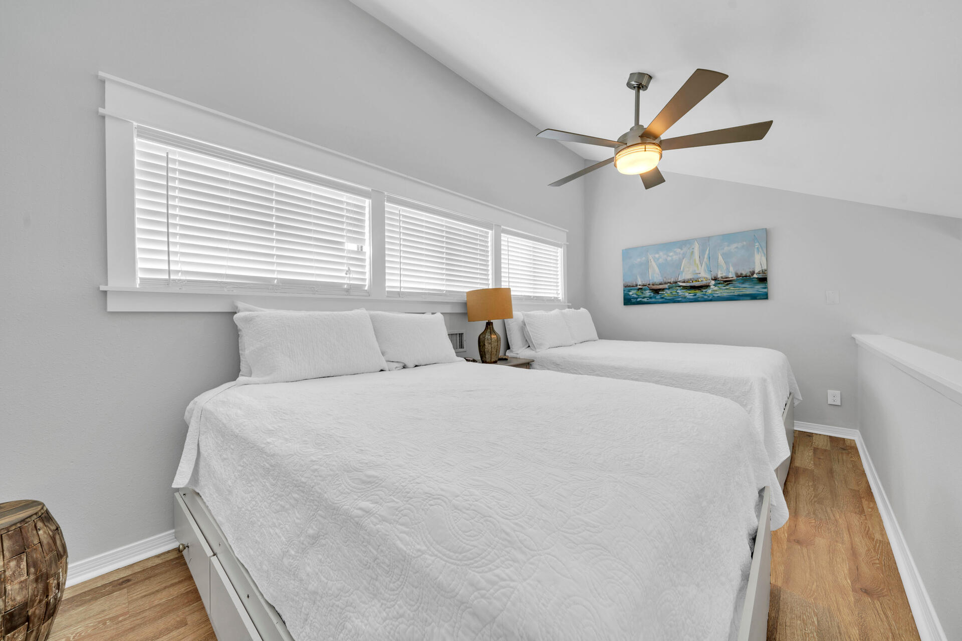 145 Beachfront Trail, Unit 303A Santa Rosa Beach, FL 32459 - Photo 16 of 38 a bedroom with a bed and window