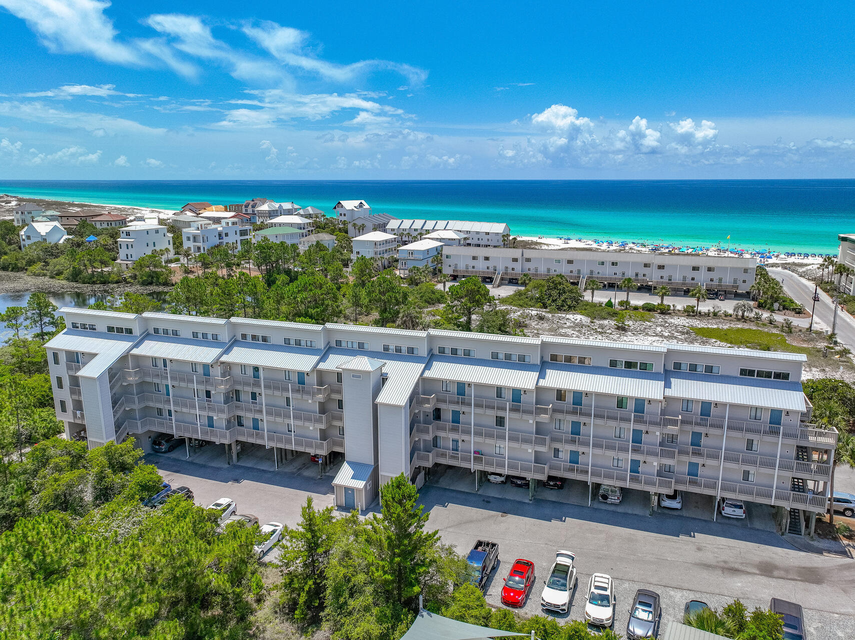 145 Beachfront Trail, Unit 303A Santa Rosa Beach, FL 32459 - Photo 22 of 38 a view of building with outdoor space