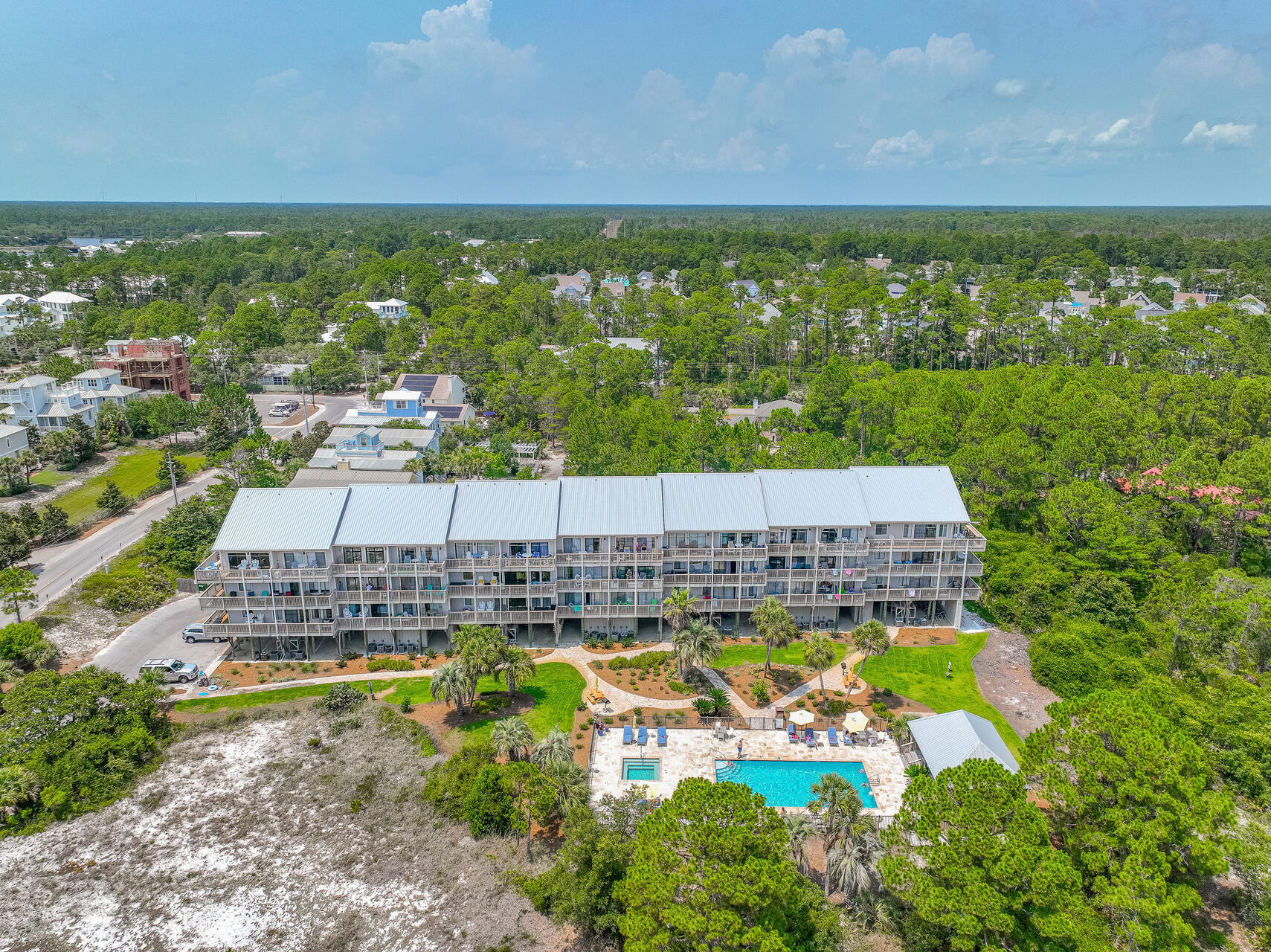 145 Beachfront Trail, Unit 303A Santa Rosa Beach, FL 32459 - Photo 27 of 38 a view of a city with tall buildings