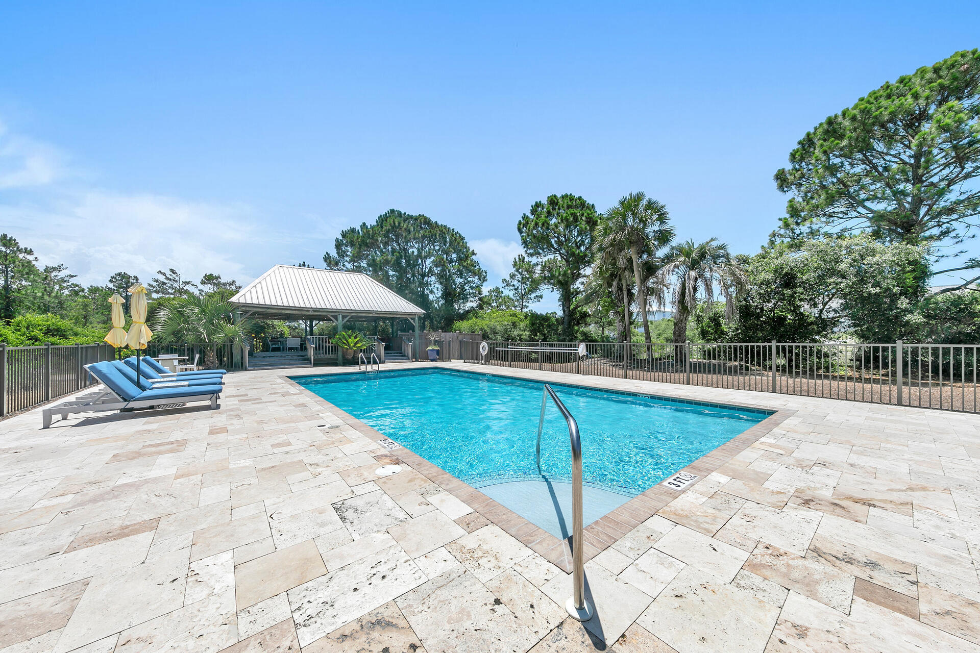 145 Beachfront Trail, Unit 303A Santa Rosa Beach, FL 32459 - Photo 31 of 38 a view of a swimming pool and lounge chairs