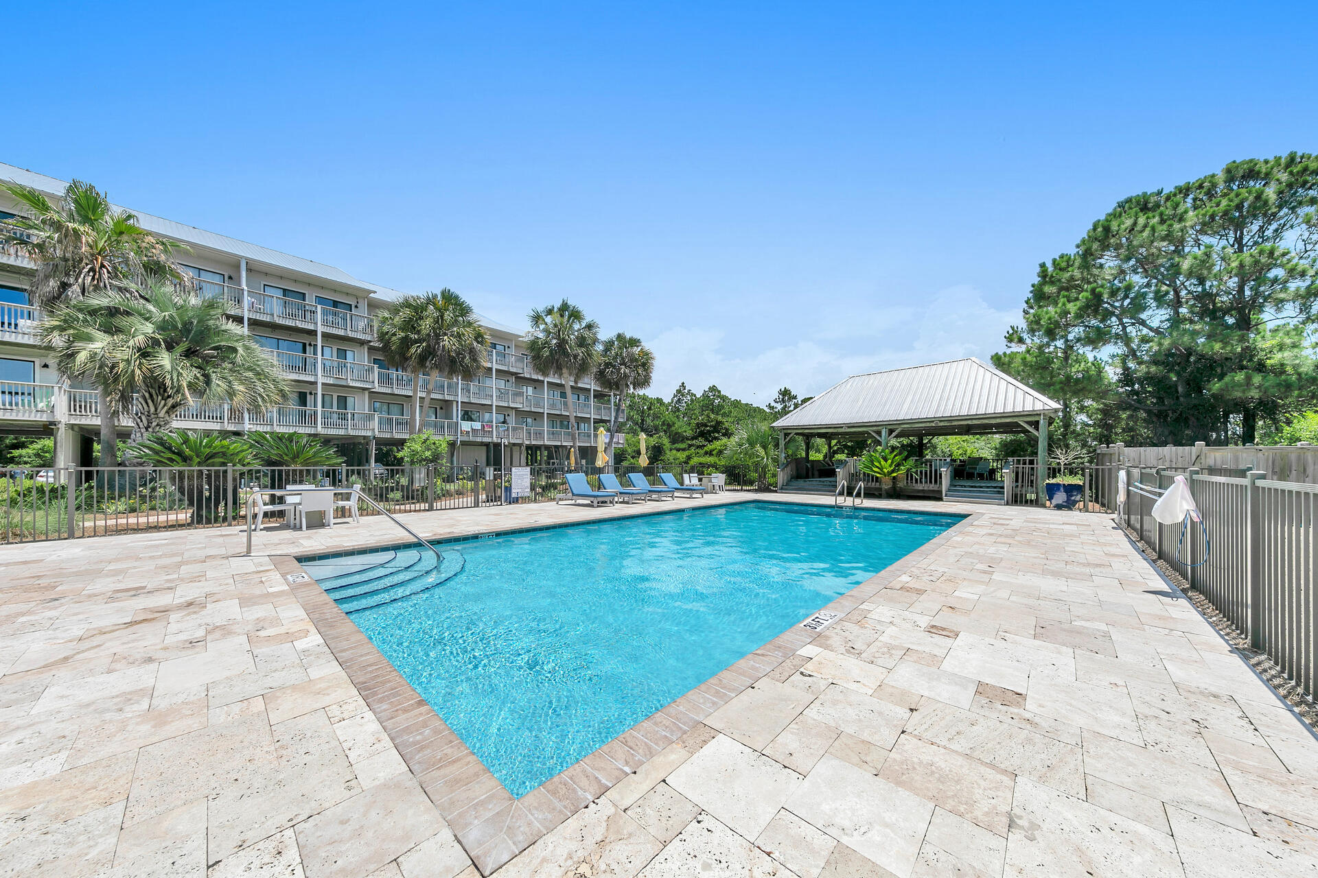 145 Beachfront Trail, Unit 303A Santa Rosa Beach, FL 32459 - Photo 35 of 38 a view of swimming pool with outdoor seating and plants