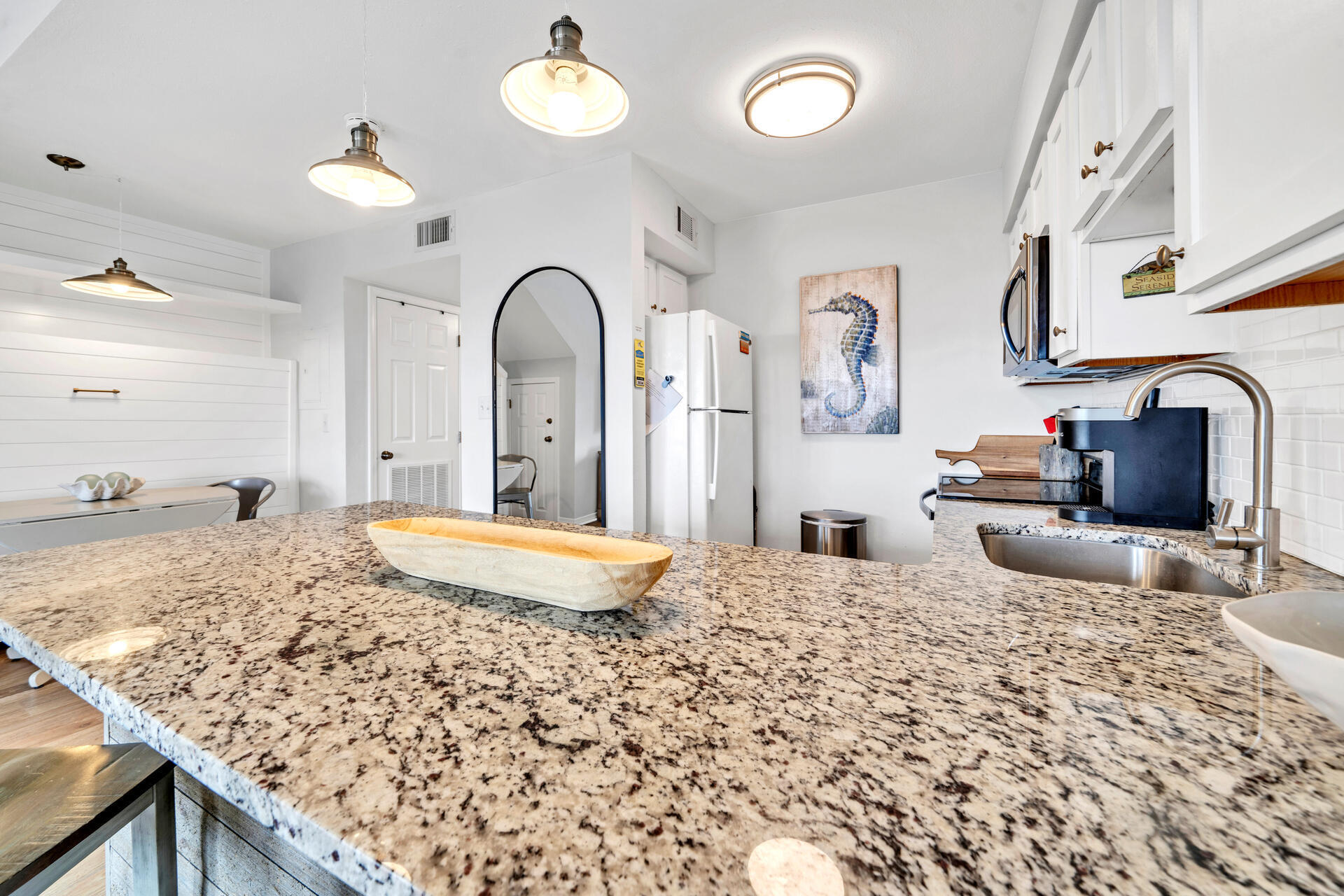 145 Beachfront Trail, Unit 303A Santa Rosa Beach, FL 32459 - Photo 8 of 38 a bedroom with a granite countertop sink and a bed