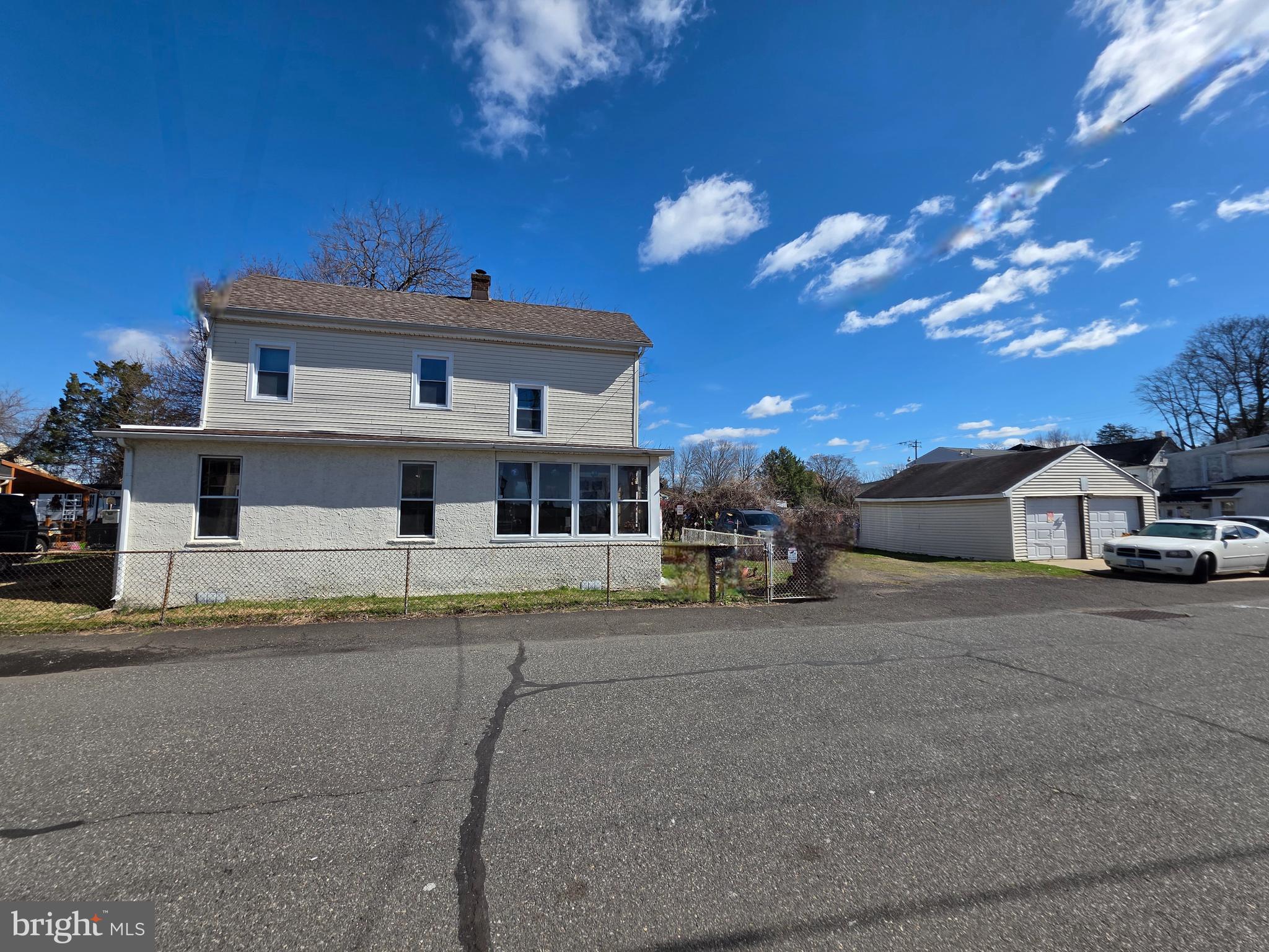 732 Brown Street Tullytown, PA 19007 - Photo 1 of 6 a front view of a house with a yard