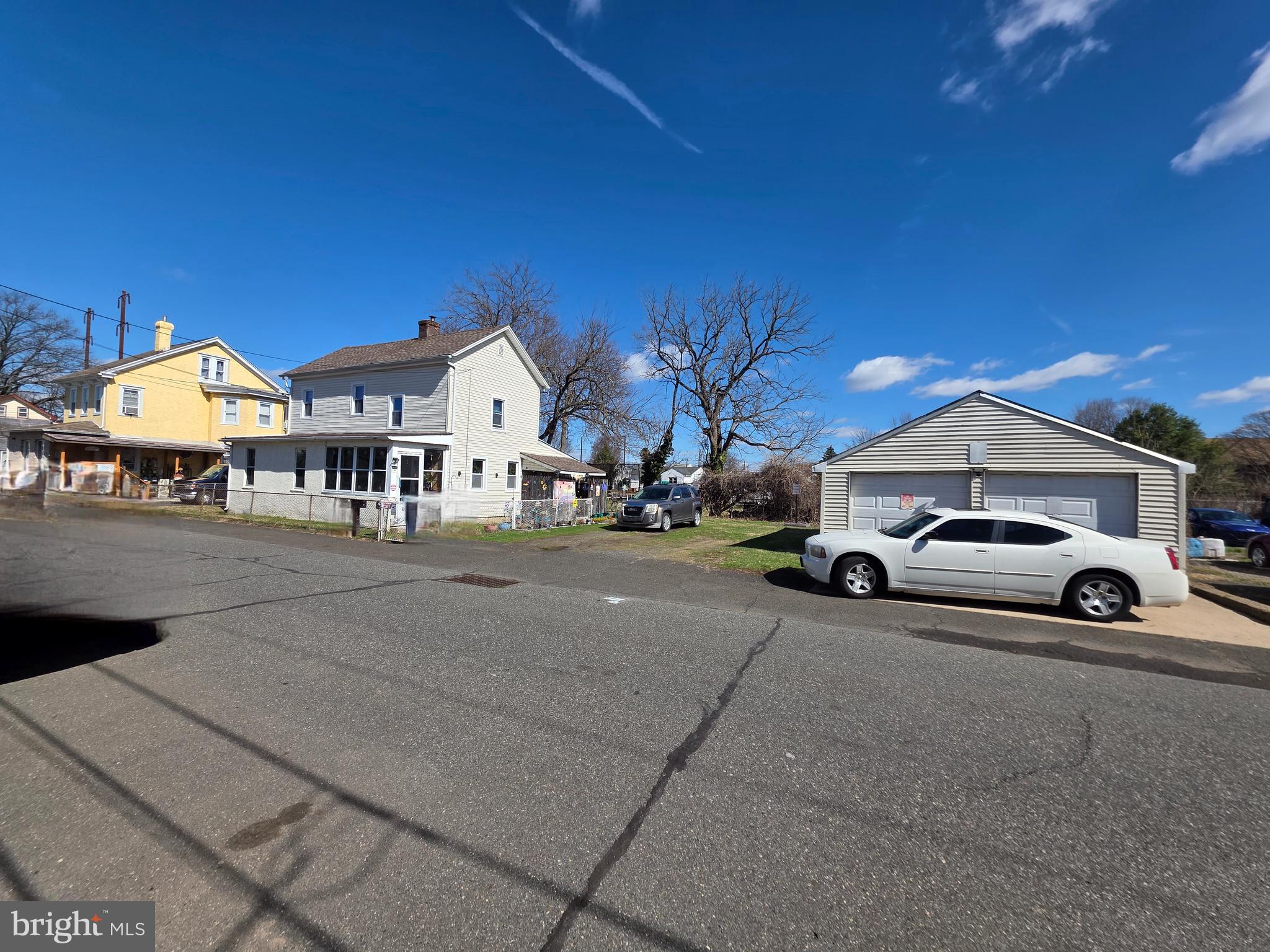 732 Brown Street Tullytown, PA 19007 - Photo 2 of 6 a view of a car park in front of a house