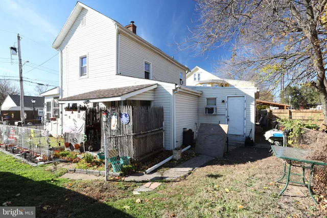 a view of path along with retail shop and buildings