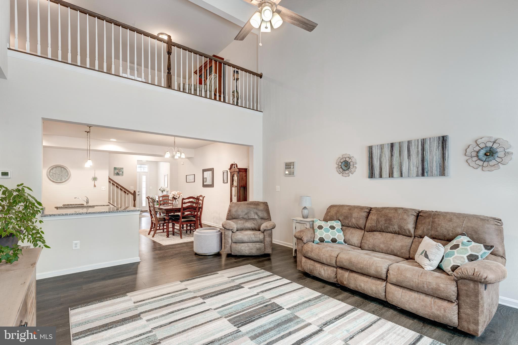 2910 Union Square Road, Unit 34 New Windsor, MD 21776 - Photo 14 of 49 a living room with furniture and wooden floor
