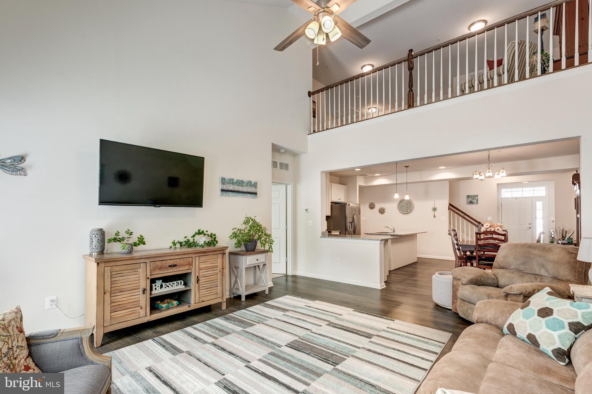 2910 Union Square Road, Unit 34 New Windsor, MD 21776 - Photo 15 of 49 a living room with furniture and a flat screen tv