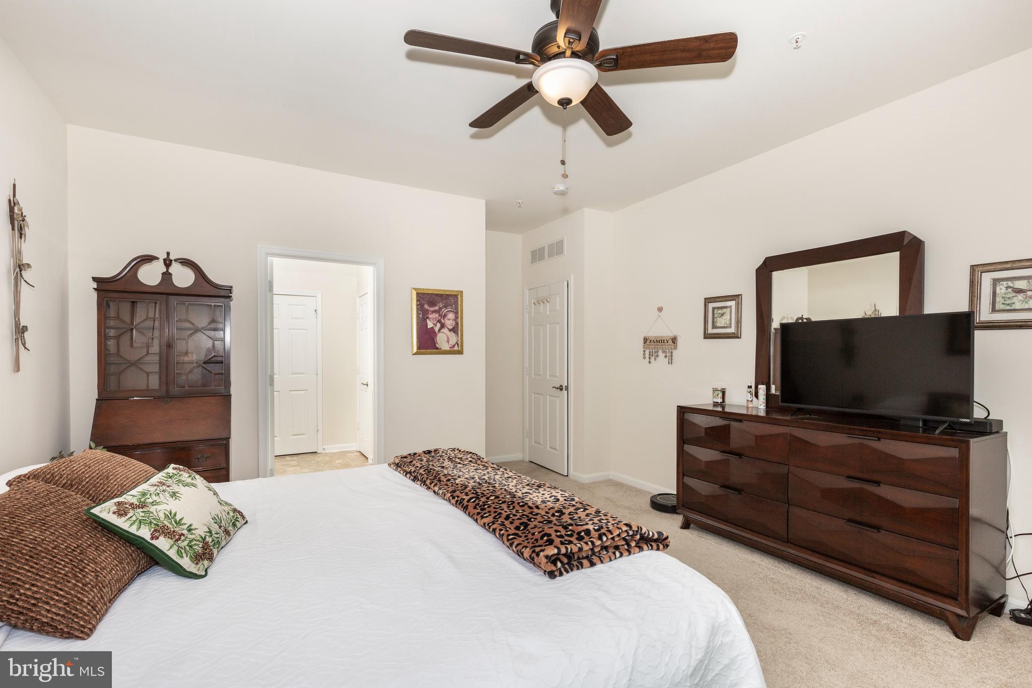 2910 Union Square Road, Unit 34 New Windsor, MD 21776 - Photo 19 of 49 a bedroom with a bed and television