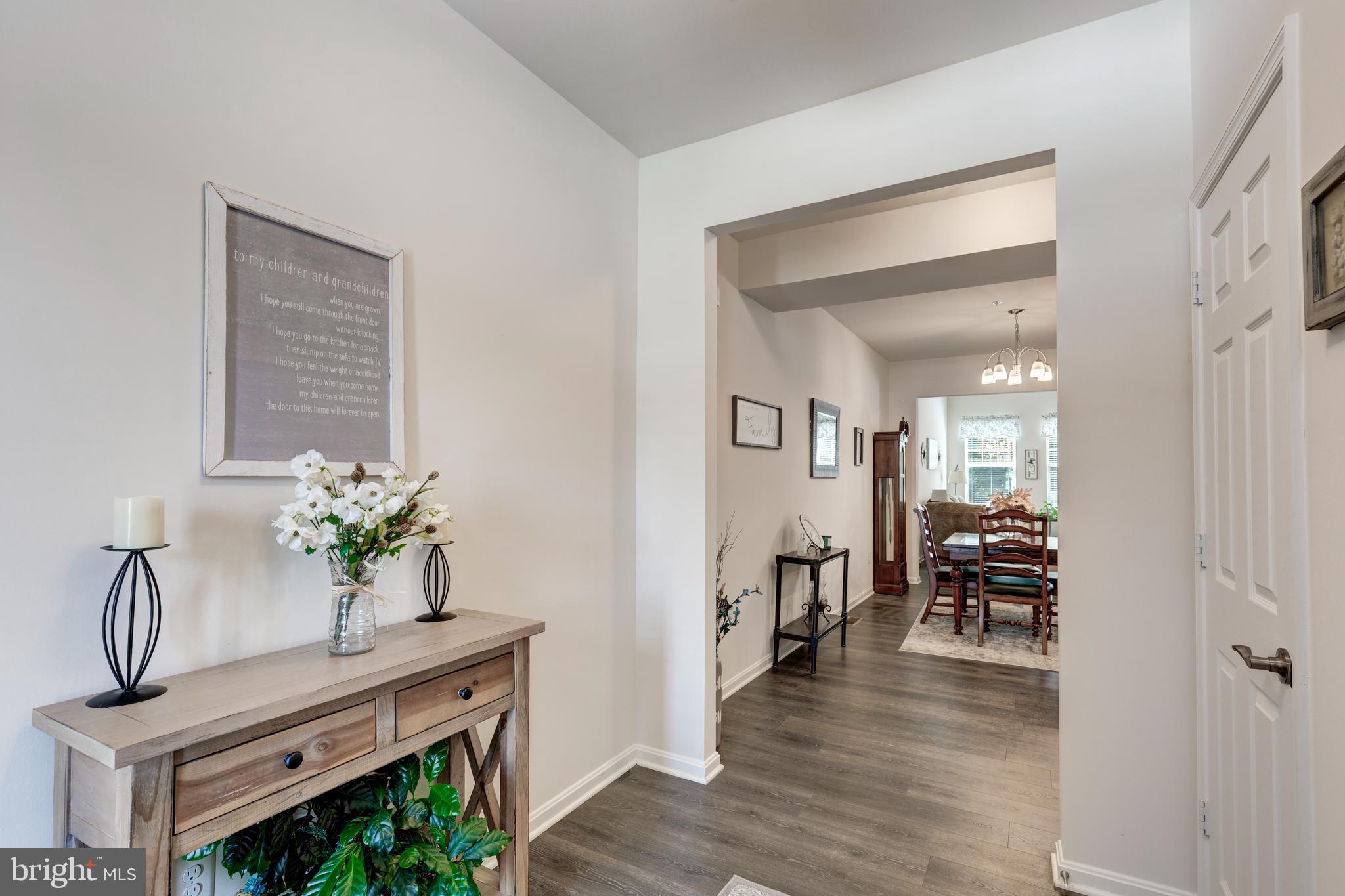 2910 Union Square Road, Unit 34 New Windsor, MD 21776 - Photo 3 of 49 a view of living room kitchen with furniture and wooden floor