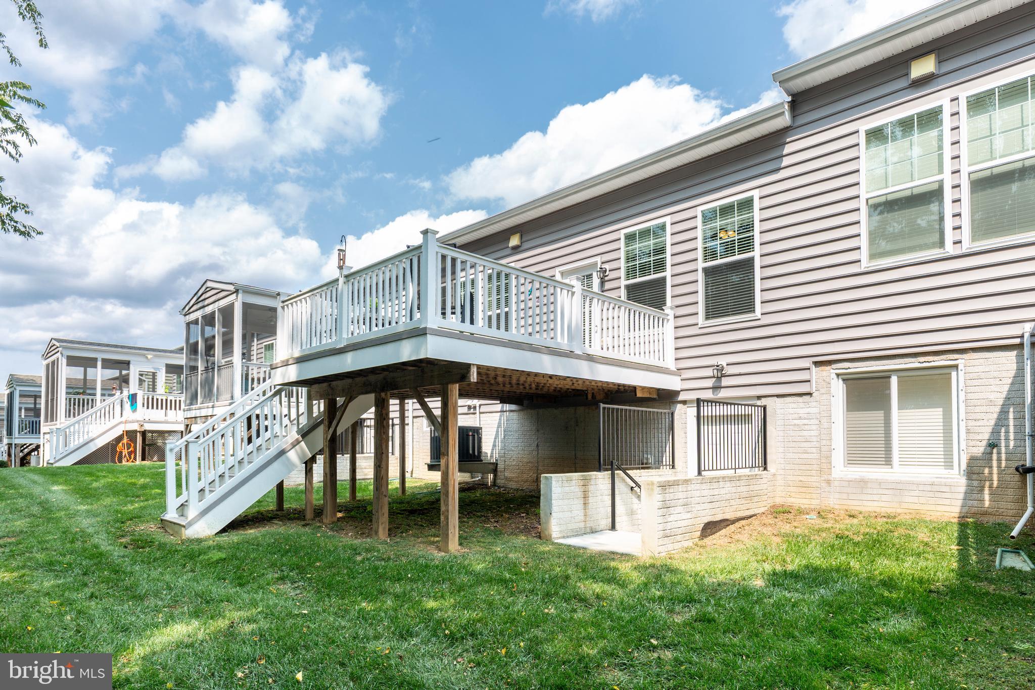 2910 Union Square Road, Unit 34 New Windsor, MD 21776 - Photo 41 of 49 a front view of a house with a yard