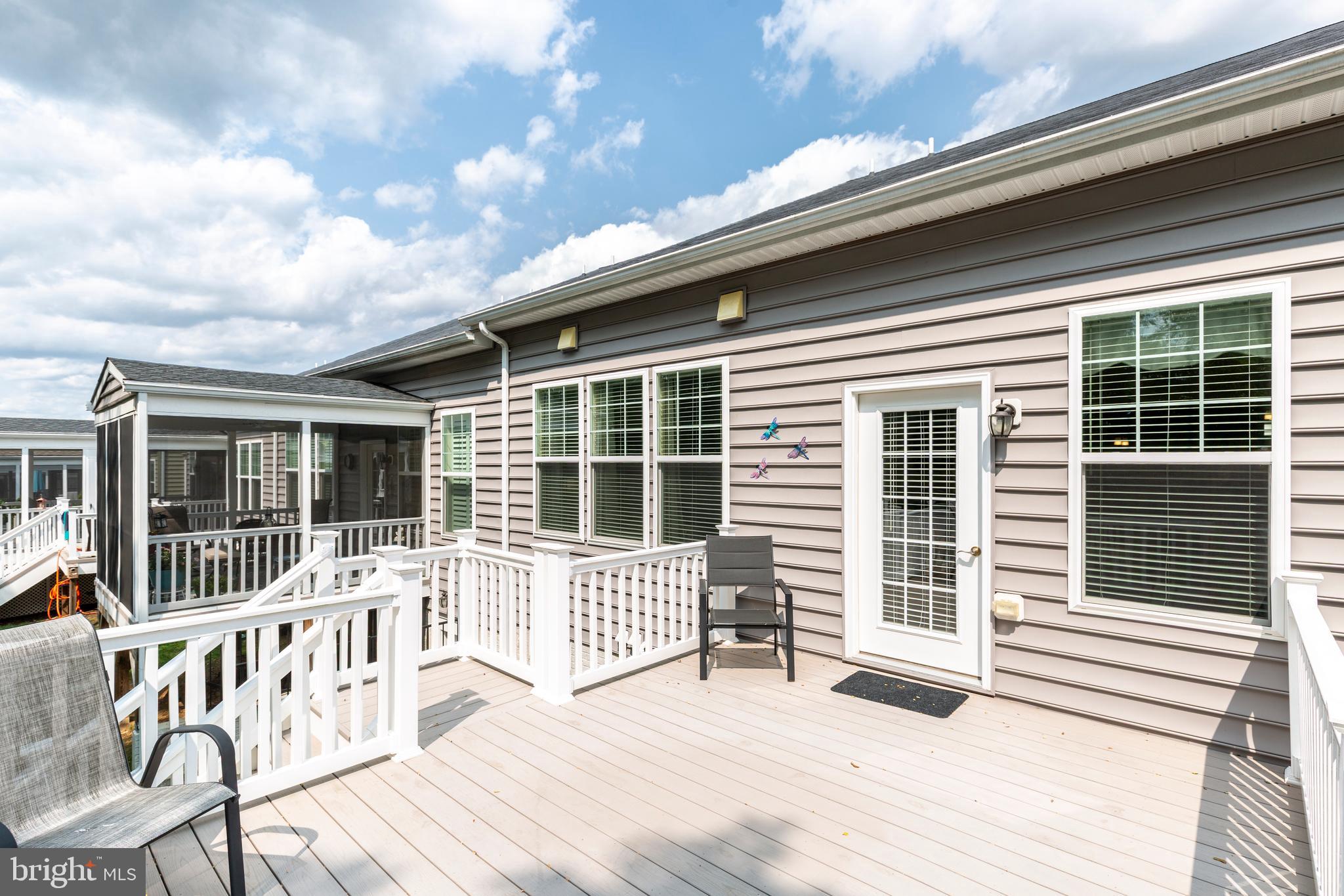 2910 Union Square Road, Unit 34 New Windsor, MD 21776 - Photo 43 of 49 a view of a house with wooden deck