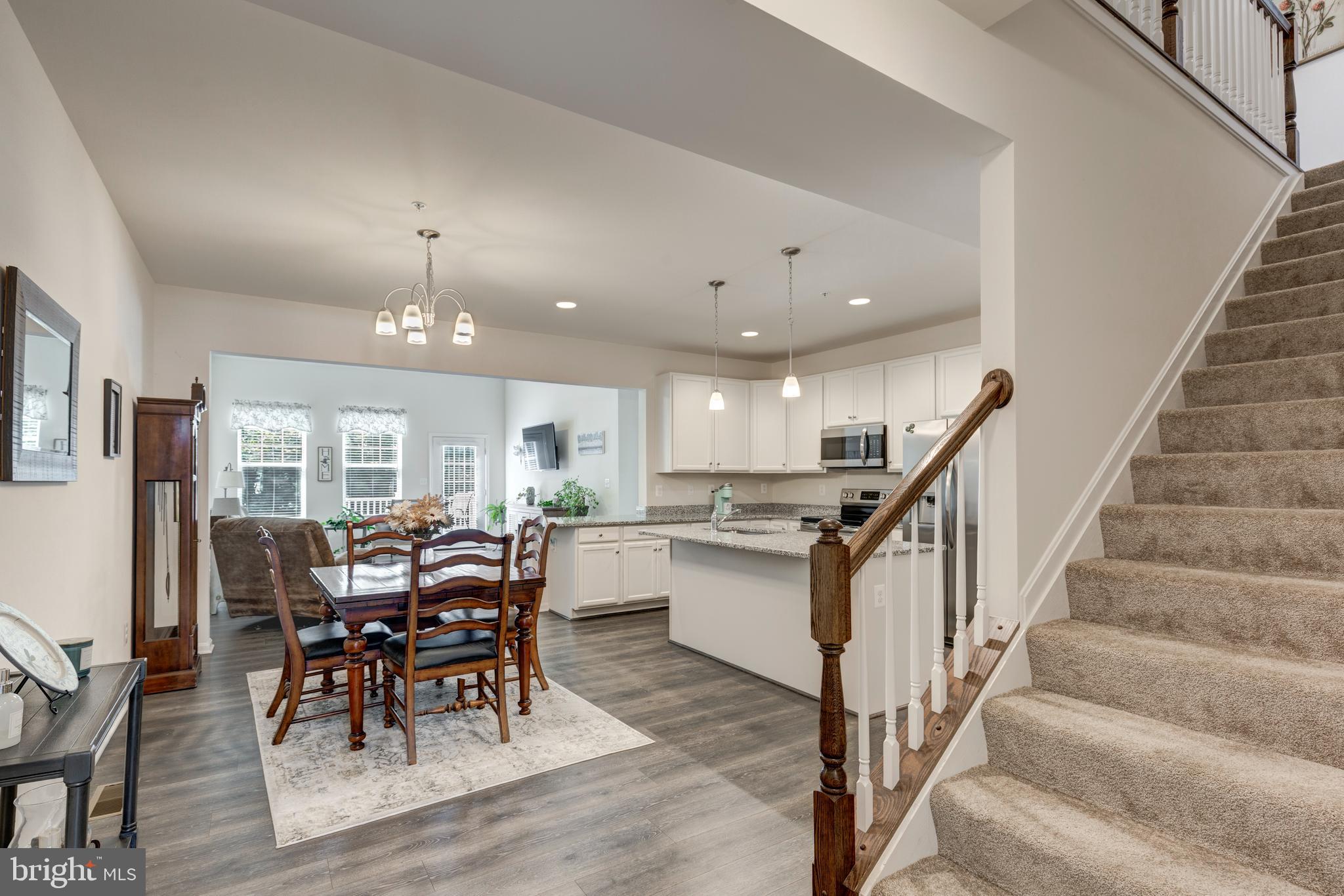 2910 Union Square Road, Unit 34 New Windsor, MD 21776 - Photo 46 of 49 a view of a dining room with furniture window and wooden floor