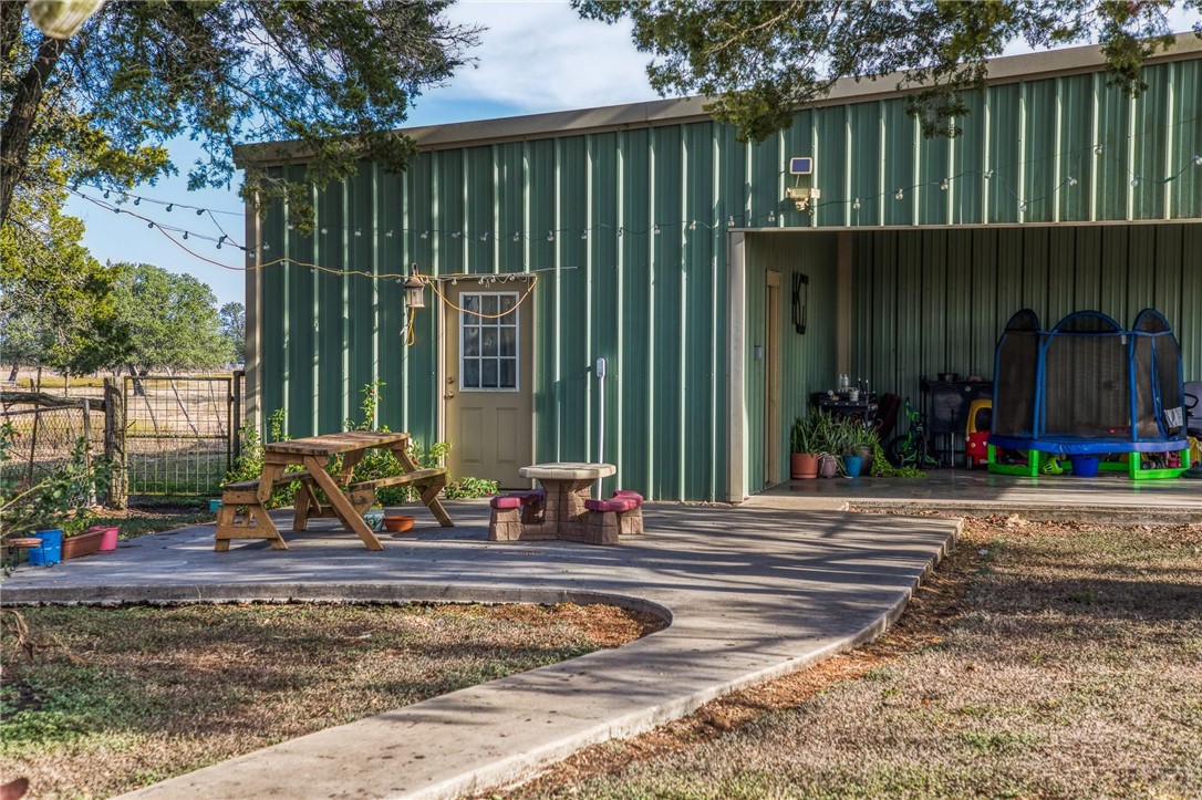 7300-2 Goehring Road Ledbetter, TX 78946 - Photo 5 of 21 front view of a house with a small yard