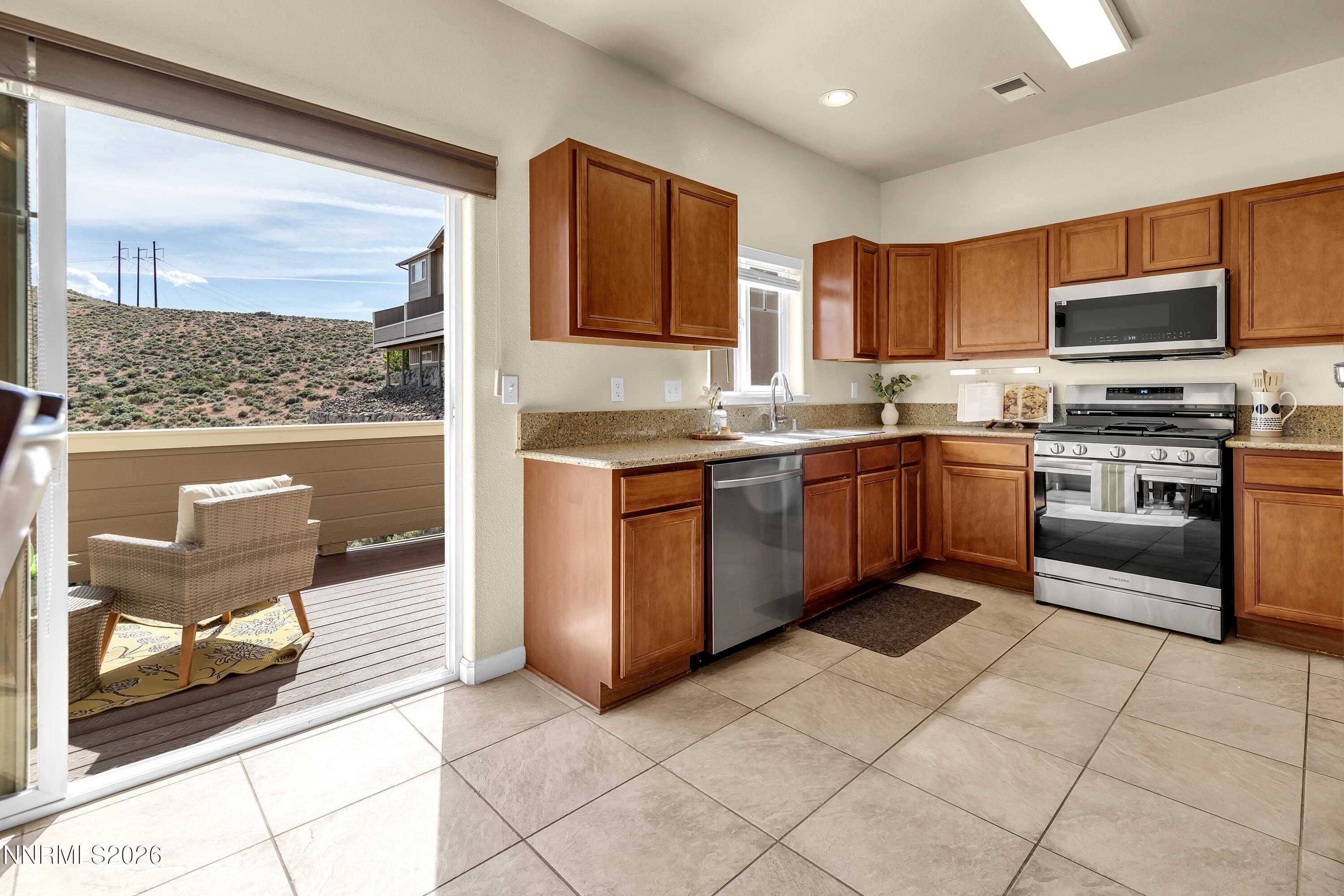 4047 Anthony James Court Reno, NV 89503 - Photo 7 of 34 Kitchen and Deck 4047 Anthony James