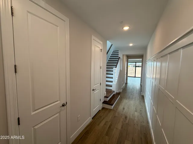 a kitchen with a refrigerator an oven