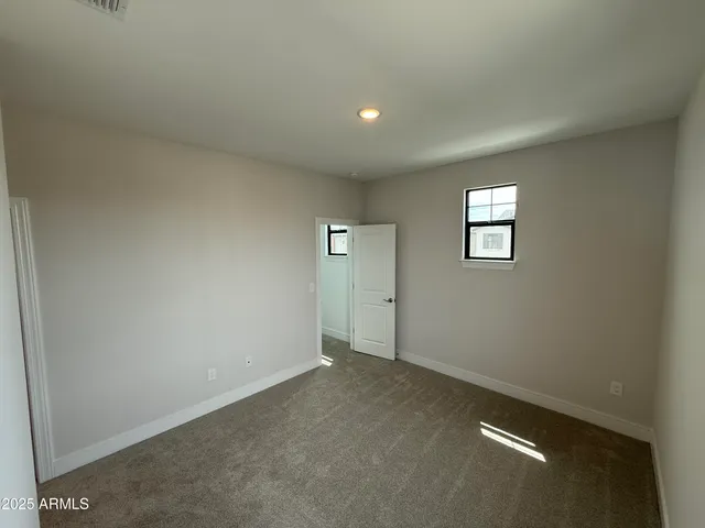 an empty room with an entryway