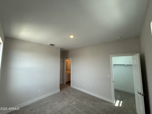 a view of a room with rack on the wall