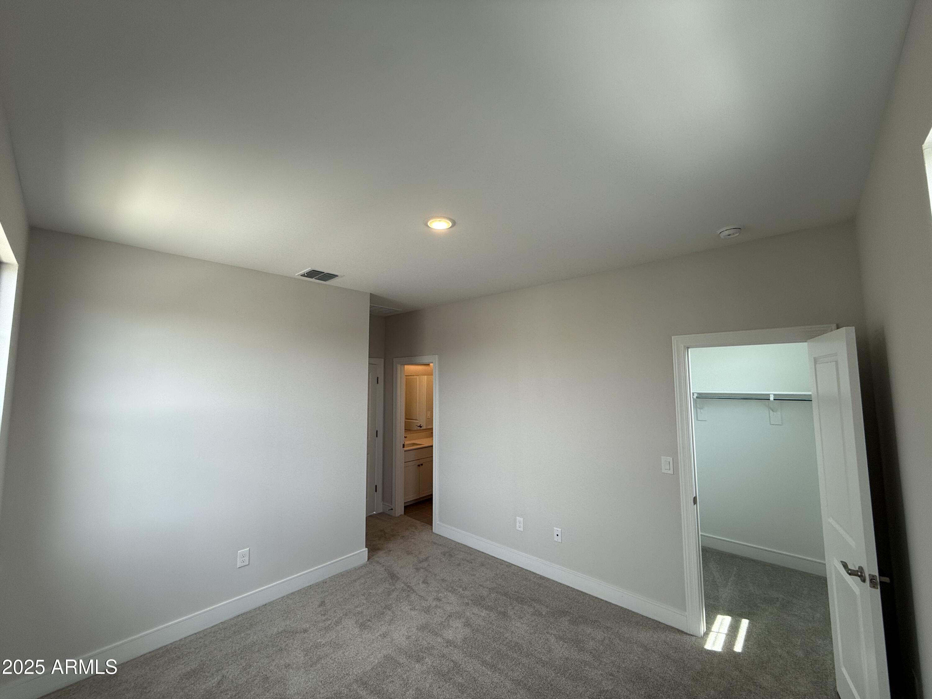 2430 West Los Arboles Place Chandler, AZ 85224 - Photo 38 of 41 an empty room with an entryway