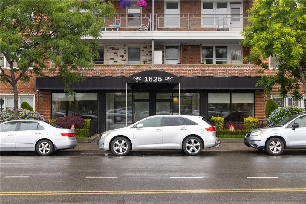 1625 Emmons Avenue, Unit 1R Brooklyn, NY 11235 - Photo 2 of 25 a car parked in front of a house
