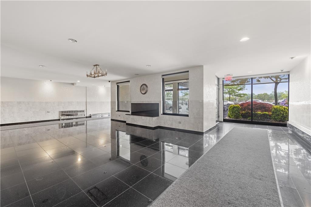 1625 Emmons Avenue, Unit 1R Brooklyn, NY 11235 - Photo 22 of 25 a view of a living room and kitchen with a large window
