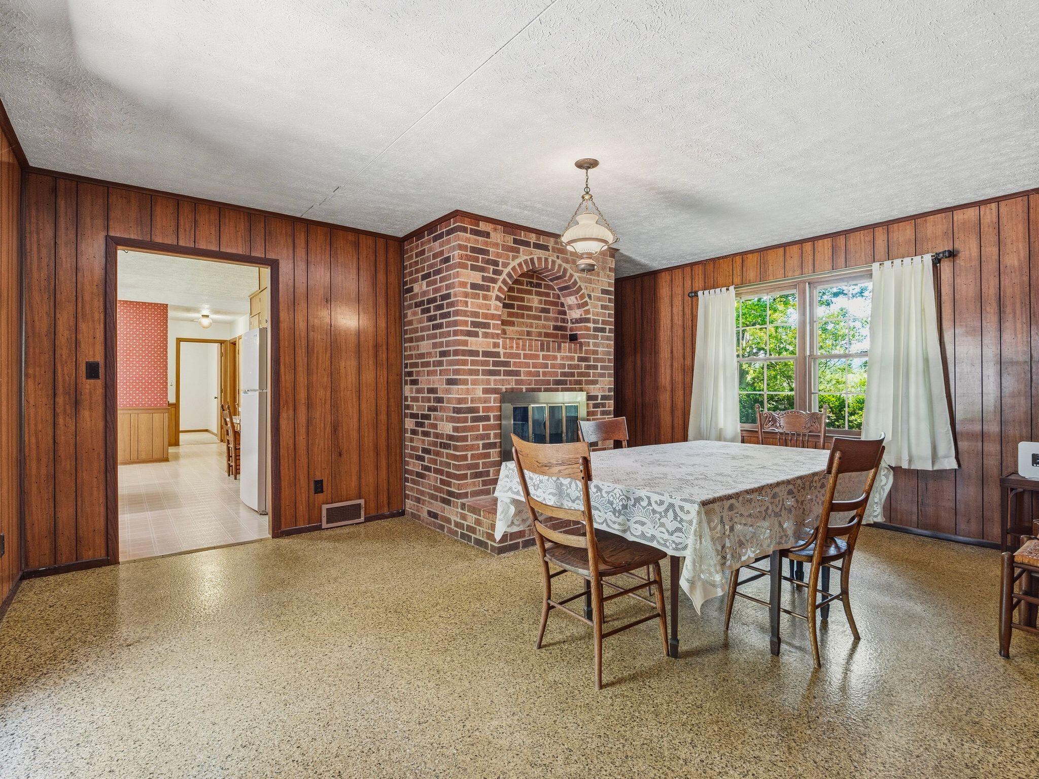 1115 Robin Ridge Road Henry, VA 24102 - Photo 13 of 54 a dining room with furniture and window