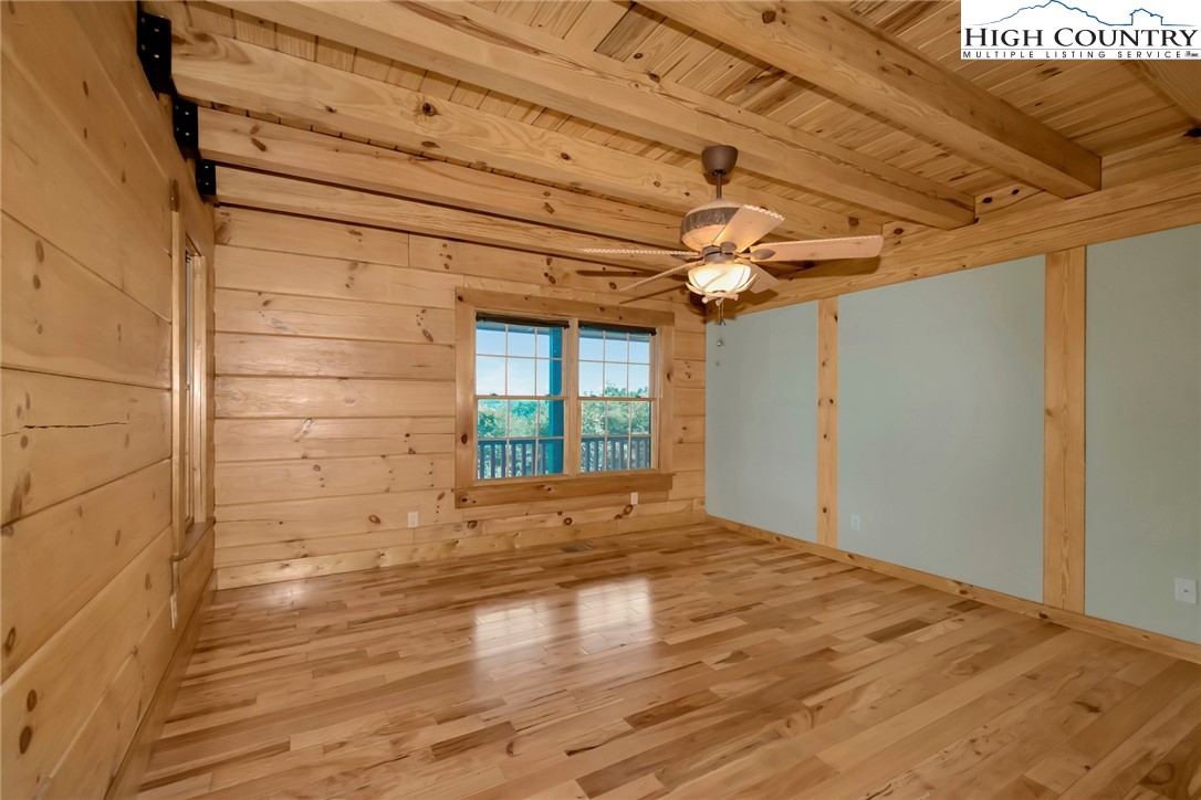 200 Nit Noi Row Boone, NC 28607 - Photo 20 of 45 a view of empty room with wooden floor and fan