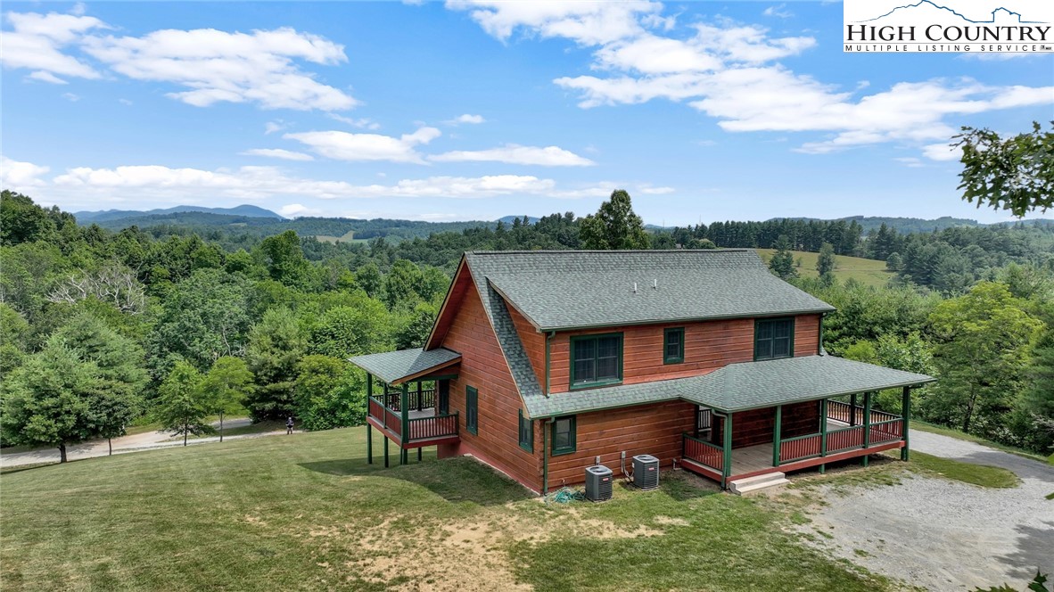 200 Nit Noi Row Boone, NC 28607 - Photo 3 of 45 a view of a house with a yard balcony and sitting area