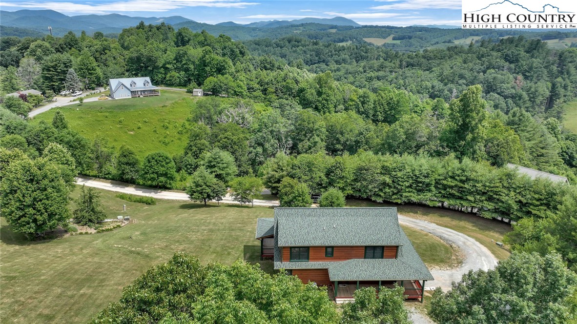 200 Nit Noi Row Boone, NC 28607 - Photo 4 of 45 an aerial view of a house with a yard