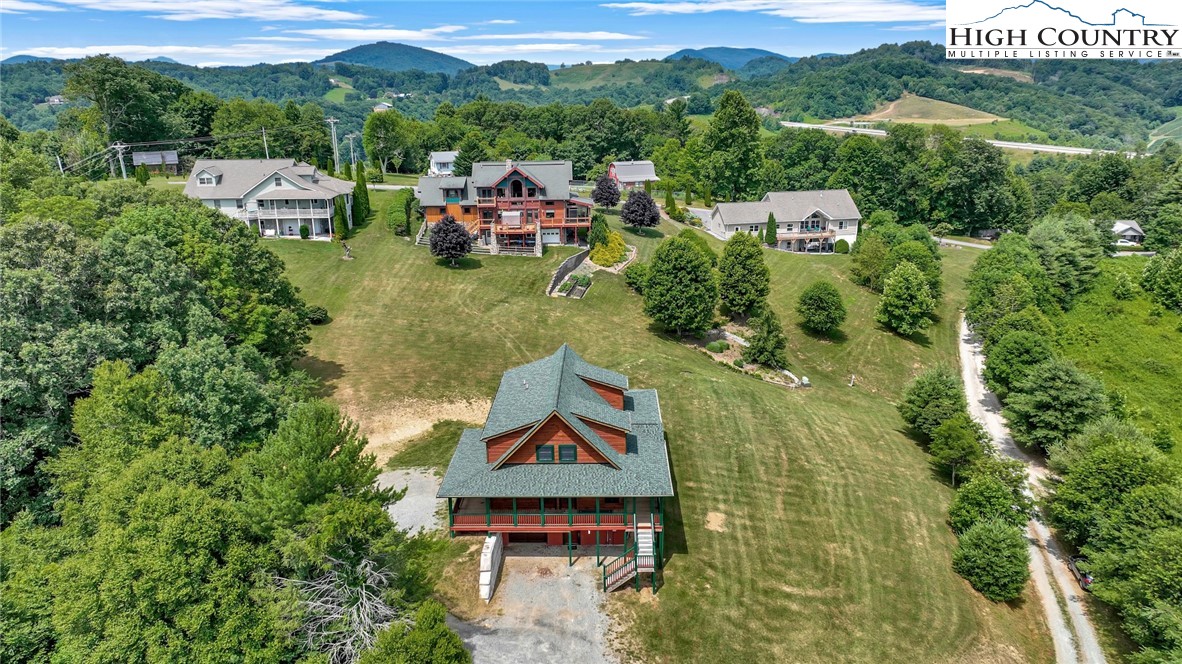 200 Nit Noi Row Boone, NC 28607 - Photo 43 of 45 a view of a street with couches and wooden fence