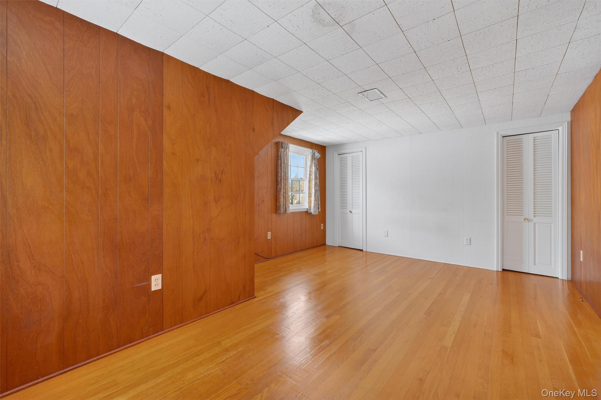 15 Valley View Road Hyde Park, NY 12538 - Photo 25 of 35 Unfurnished room featuring wooden walls and light wood-style flooring