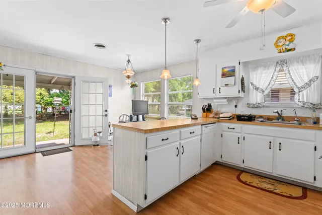 a kitchen with a window a sink and counter space