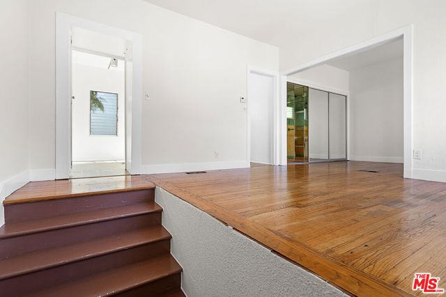 a view of wooden floor and staircase