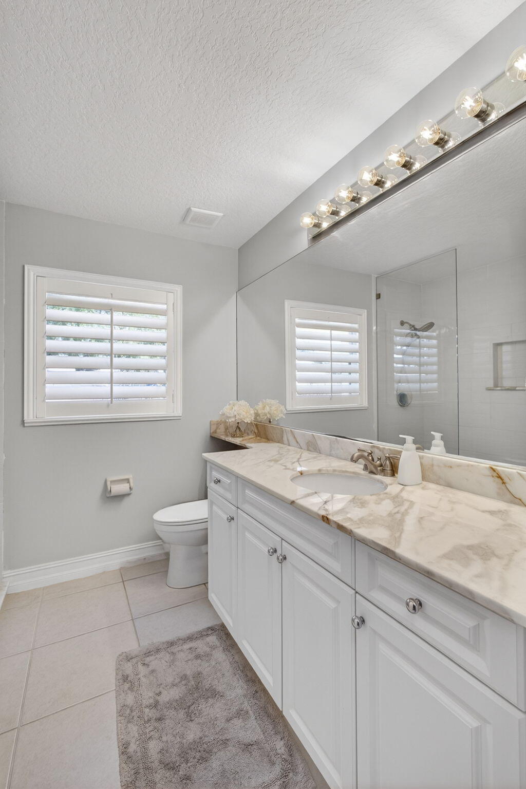 8075 Southeast Governors Way Hobe Sound, FL 33455 - Photo 22 of 35 Guest Bathroom