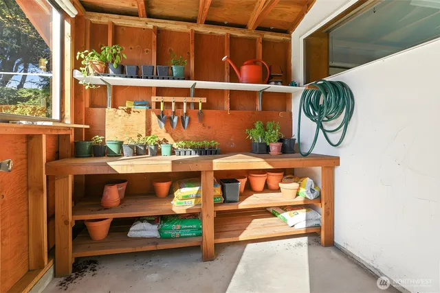 a front view of a house with large windows