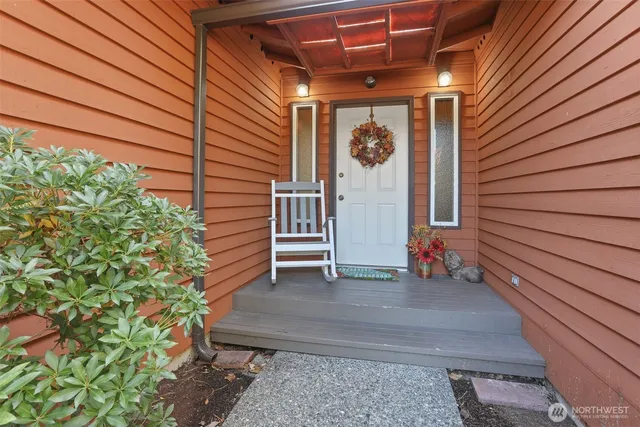 a view of a porch with a bench