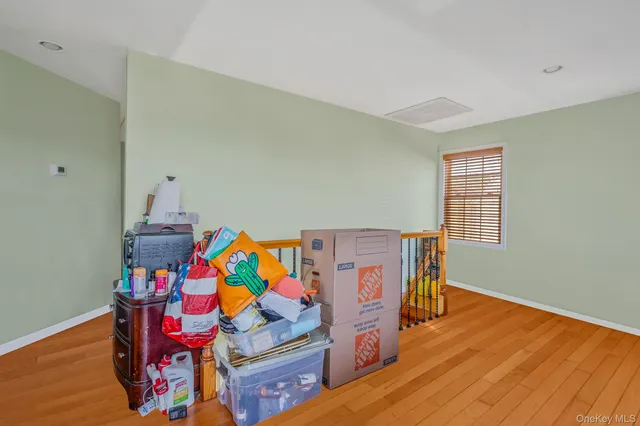 a room with toys and wooden floor