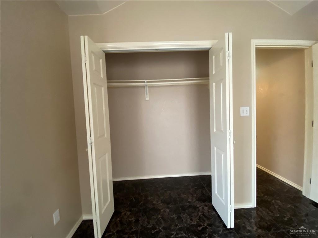 2207 Paseo Encantado Mission, TX 78572 - Photo 28 of 44 a view of a room with rack on the wall