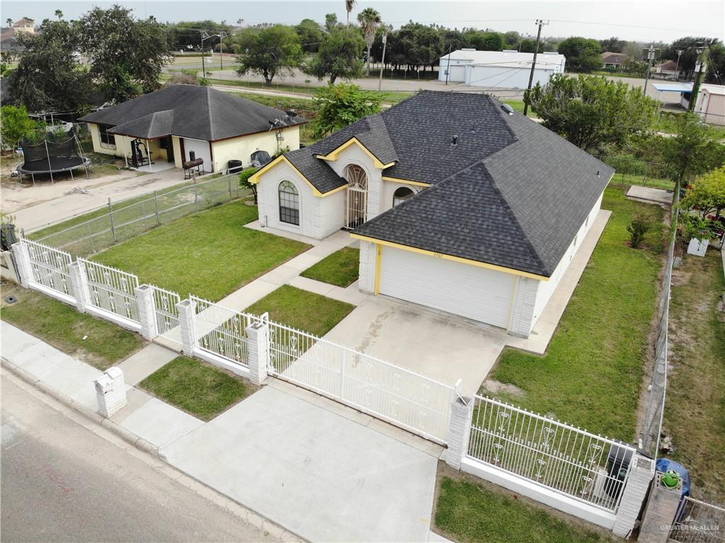 2207 Paseo Encantado Mission, TX 78572 - Photo 3 of 44 an aerial view of a house with backyard