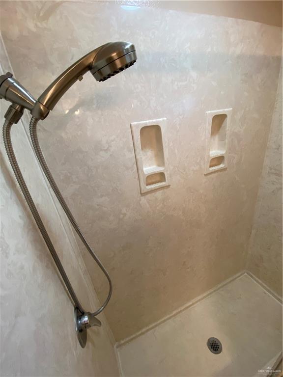 2207 Paseo Encantado Mission, TX 78572 - Photo 31 of 44 a bathroom with a tub