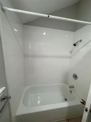a close up of a bathtub in a bathroom
