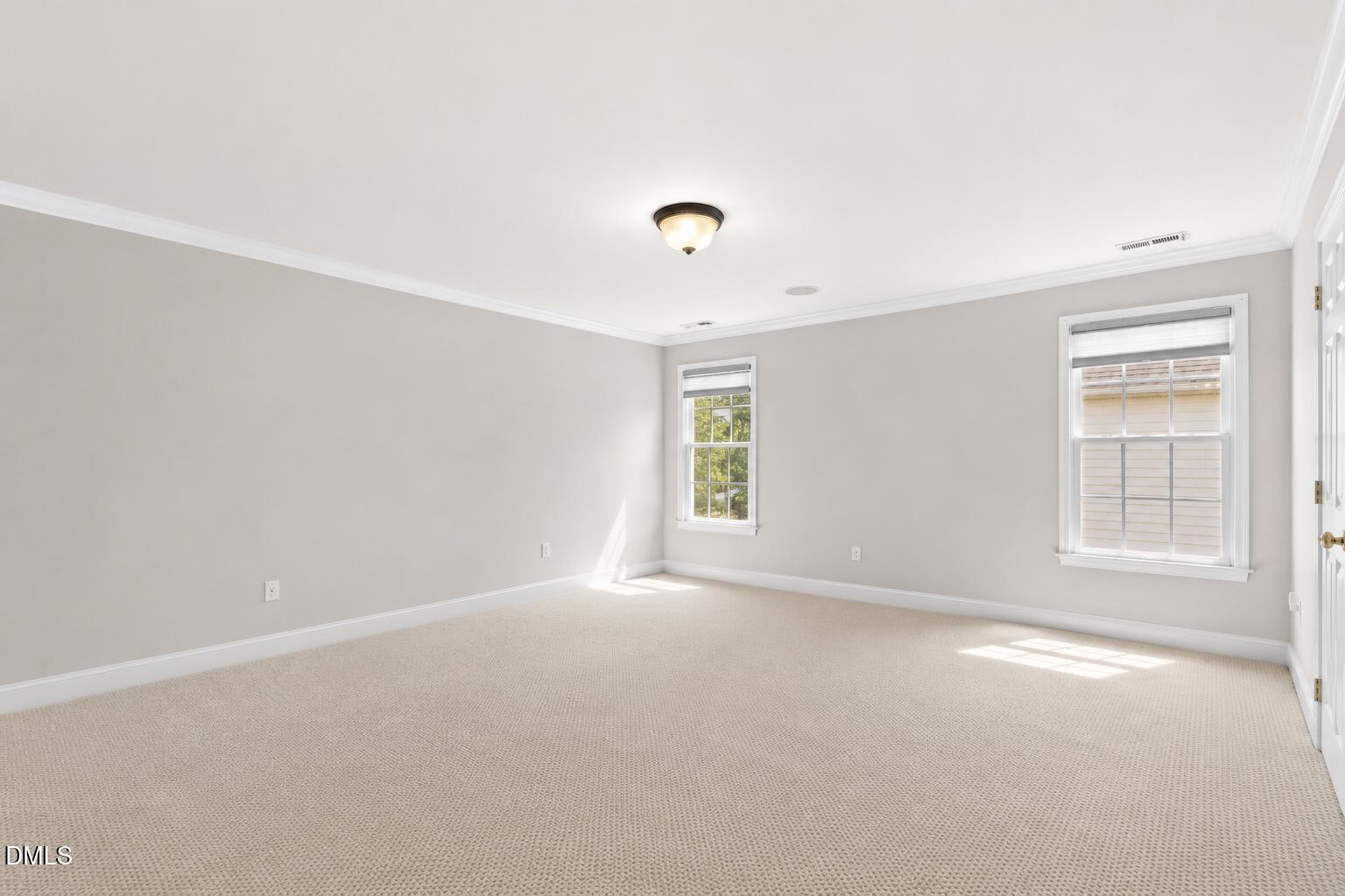 11708 Dellcain Court Raleigh, NC 27617 - Photo 29 of 67 Primary Bedroom