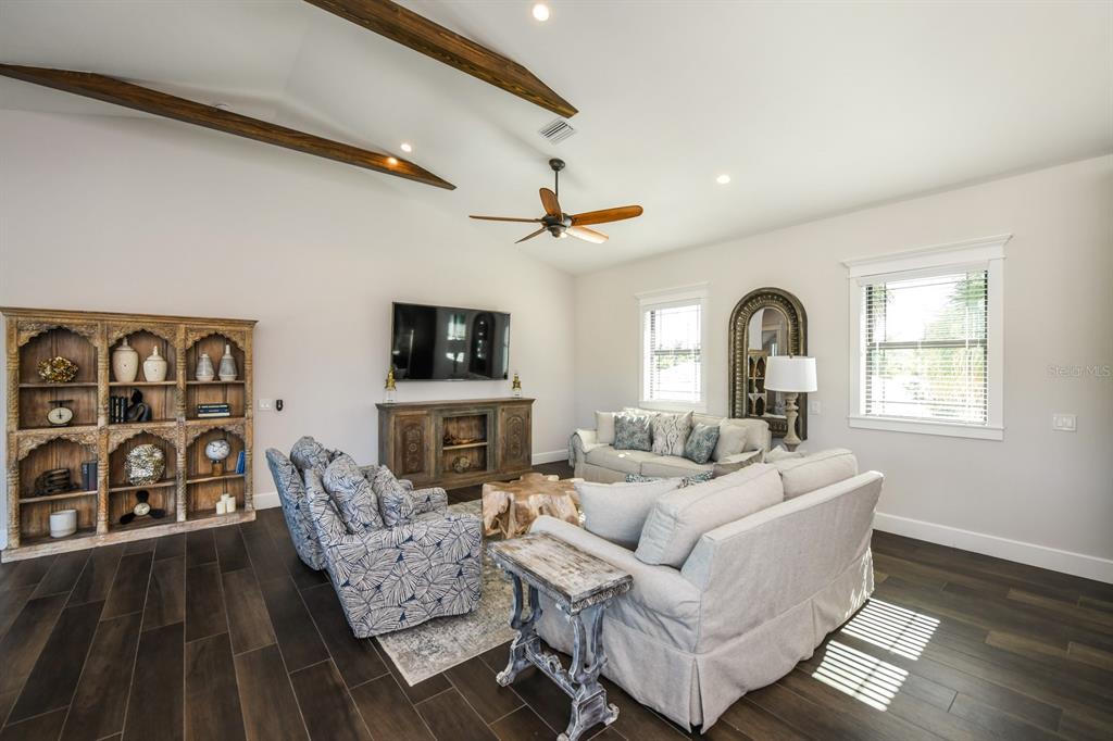 340 Jackson Drive Sarasota, FL 34236 - Photo 11 of 100 a living room with fireplace furniture and a flat screen tv
