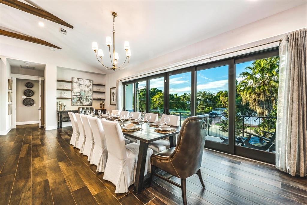 340 Jackson Drive Sarasota, FL 34236 - Photo 24 of 100 a view of a dining room with furniture window and wooden floor